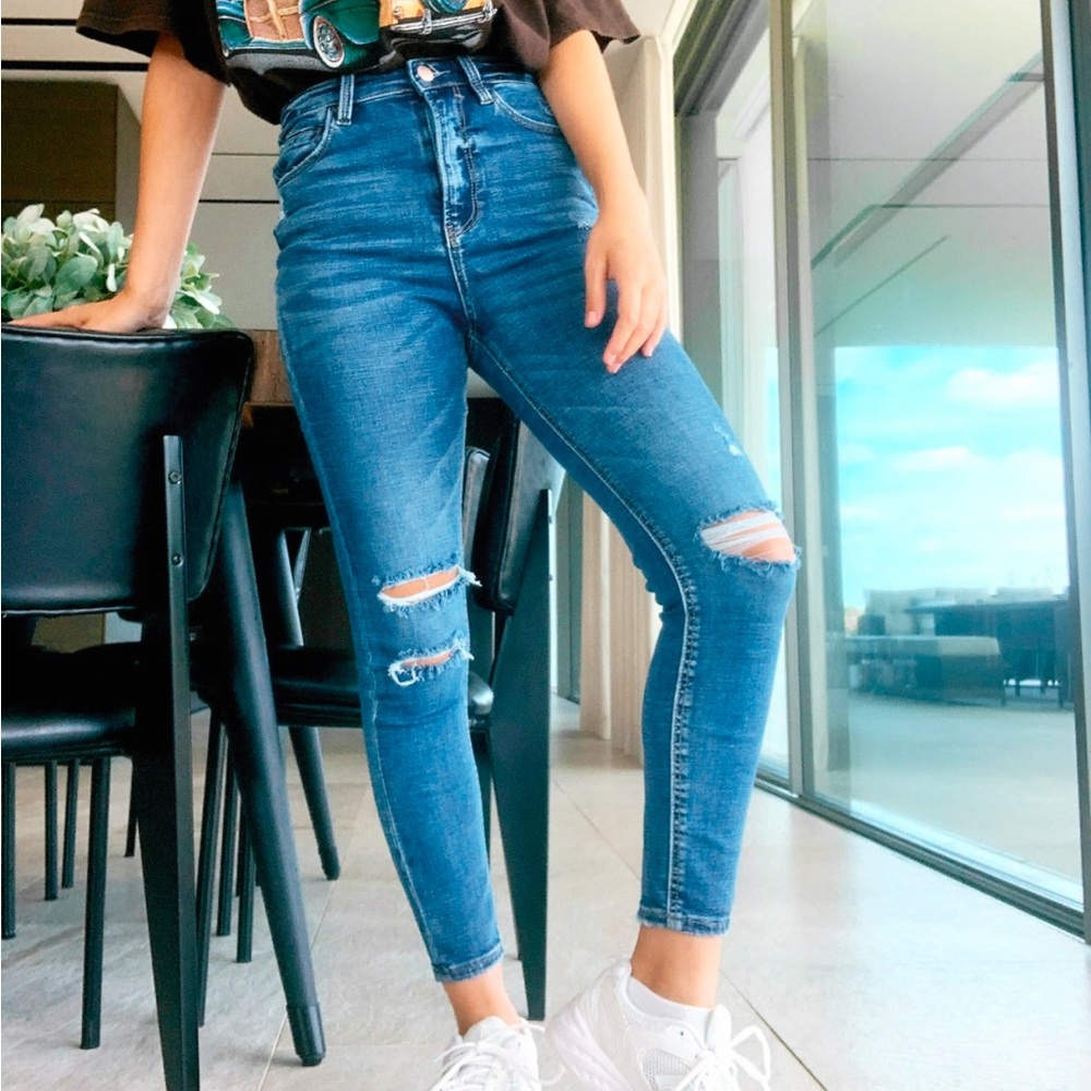 High-Waisted Blue Distressed Jeans